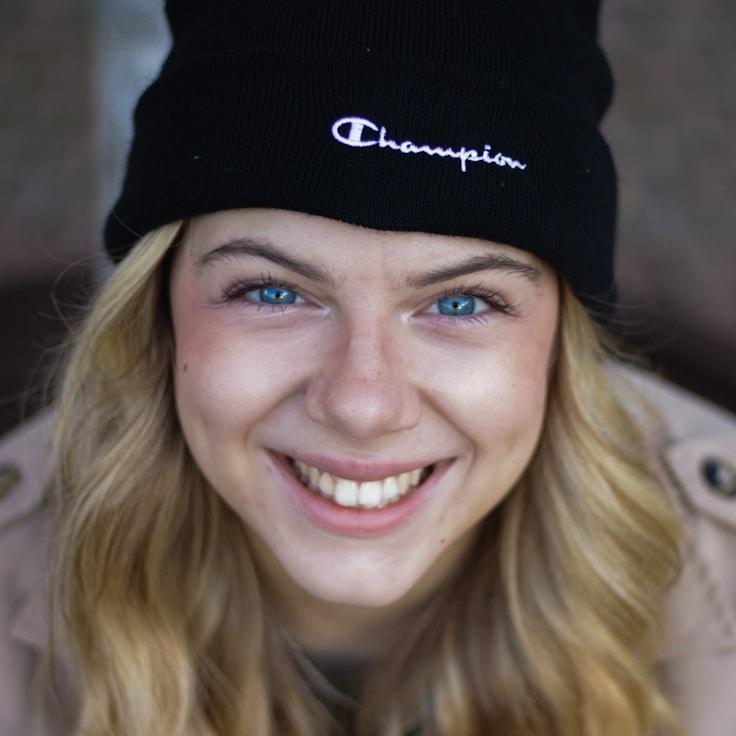 Kaveri Mehta, Lead Design Curator at Cobalt Canvas Lab, reviewing corporate floral arrangements